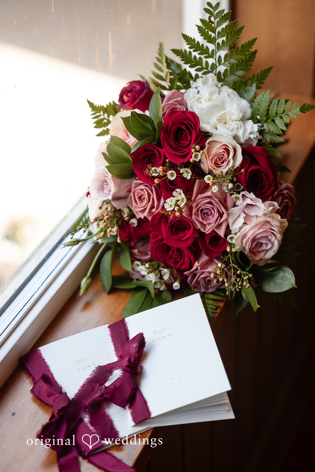 Beautiful floral bouquet  and card display at  Backyard Wedding