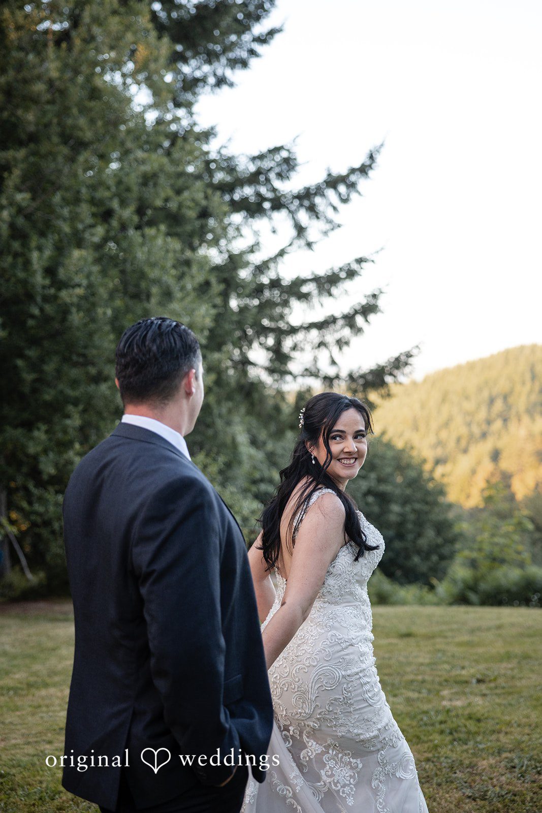 Portland Wedding Photographers capturing couple walking together slowly in a romantic way  by Original Weddings