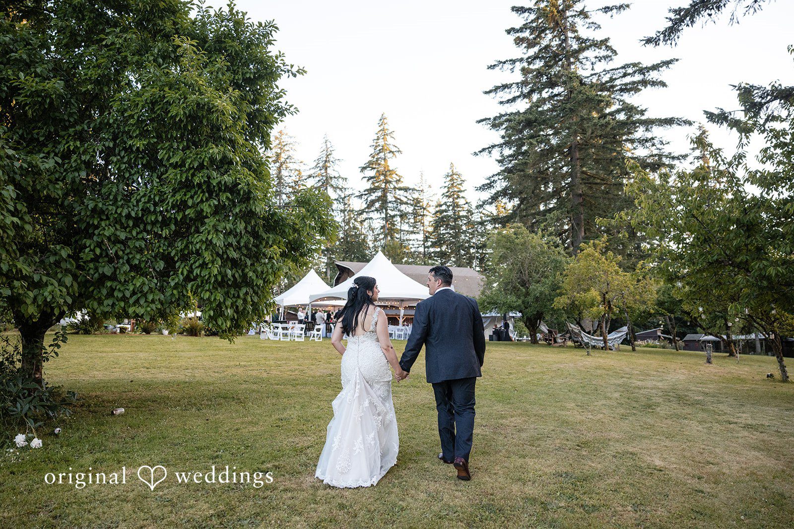 Newlyweds walking away after ceremony