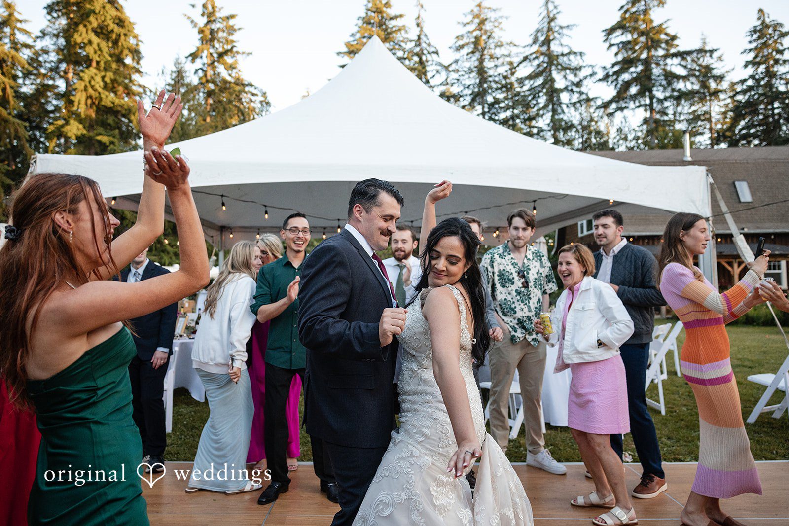 Portland Wedding Photographers capturing couple enjoying dance celebration by Original Weddings