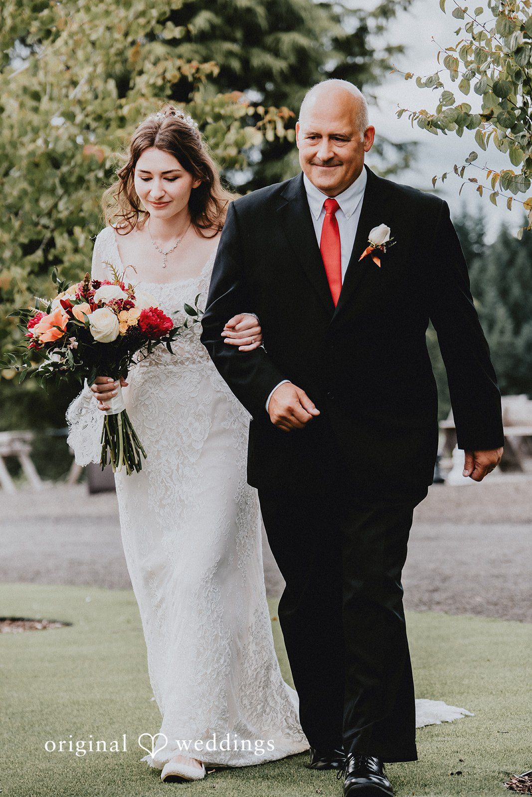 Catherine + Gabriel Bride walking down the aisle on a man's arm at Oregon Backyard Wedding.