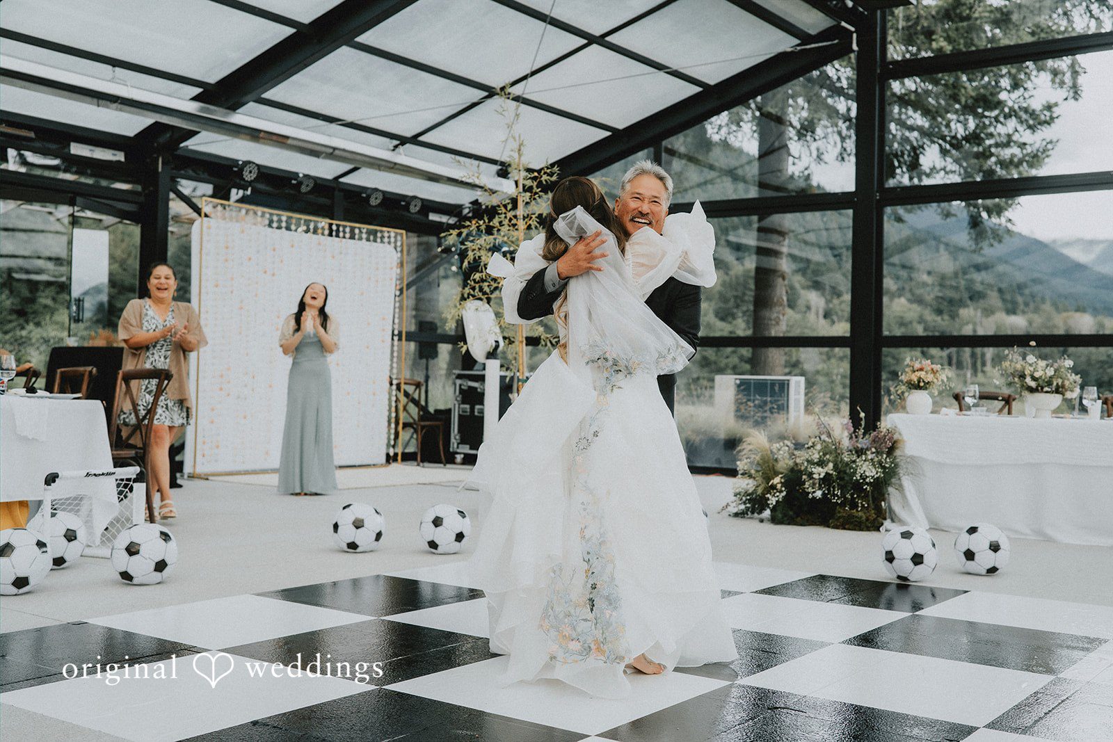 Ben + Erin Bride sharing an emotional dance with someone