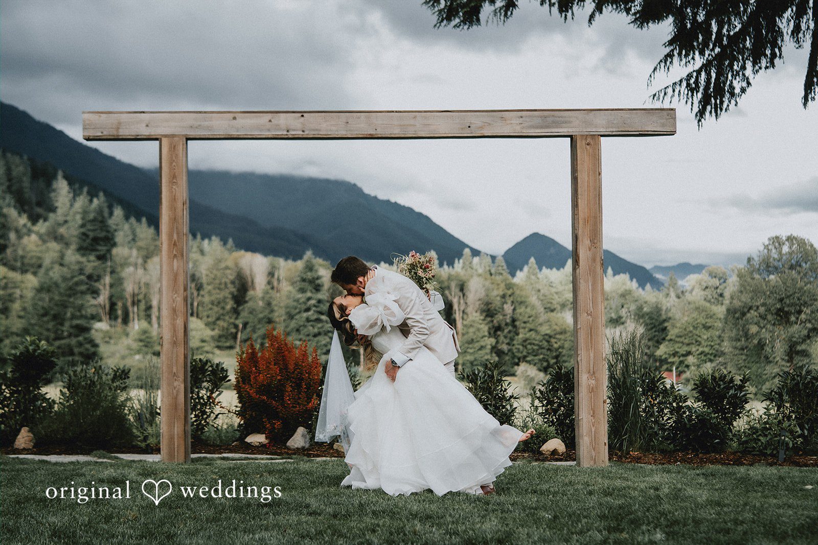 Ben + Erin Bride and groom sharing their kiss after the ceremony at Paradise Inn