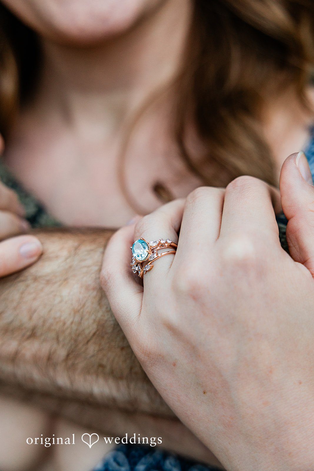 Megan + Kevin Close-up shot focusing on a woman's hand showcasing an engagement ring.