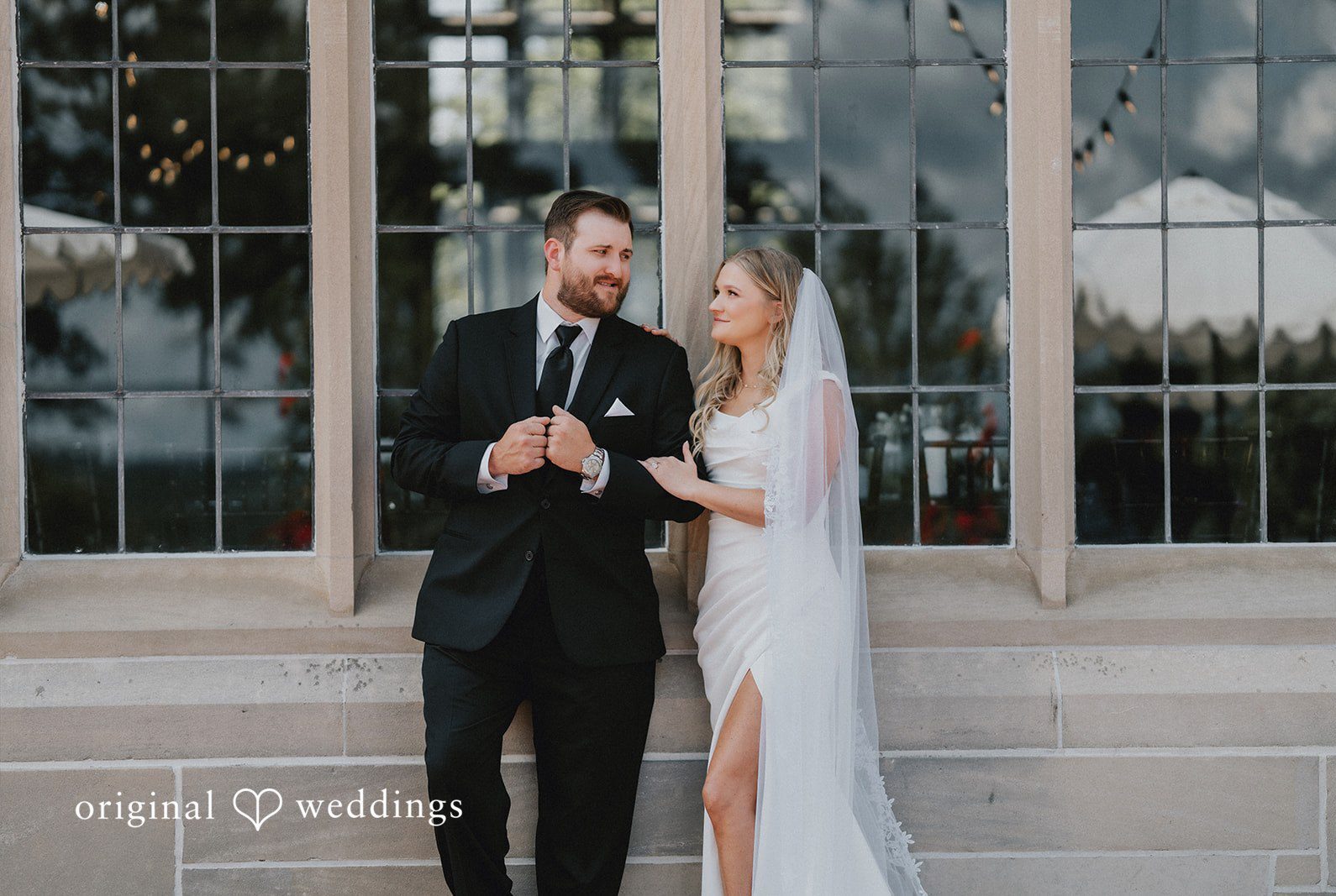 Stunning portrait of couple at Pine Knob Mansion by Detroit Wedding Photographers from Original Weddings.