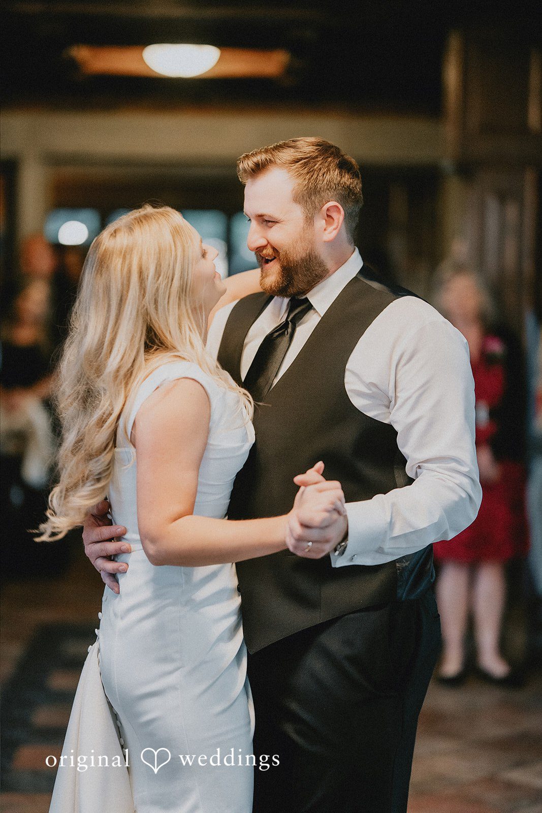 Bride and groom sharing their first dance at the reception.