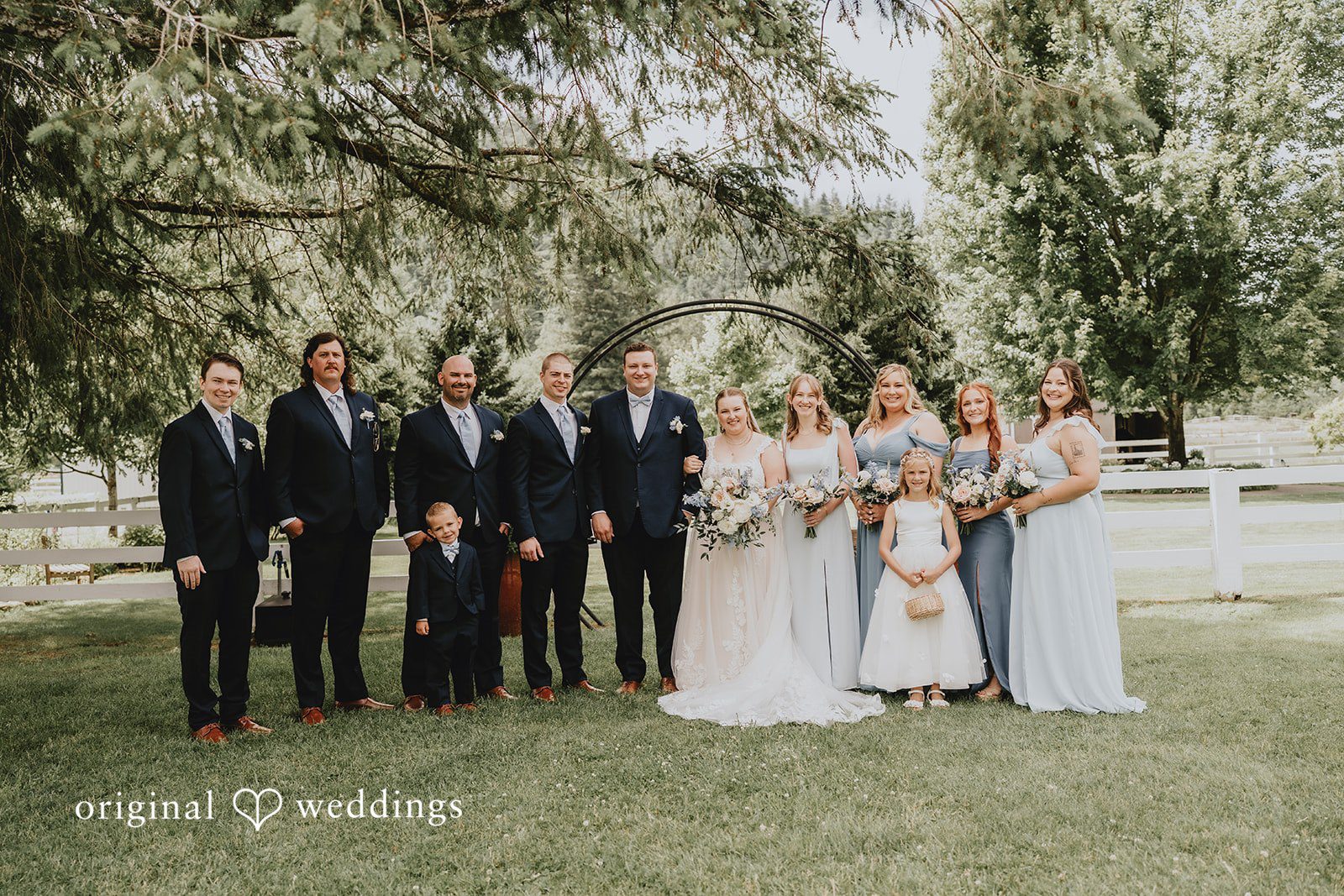 Natalie + DJ Group picture of bride and groom with bridesmaids and groomsmen