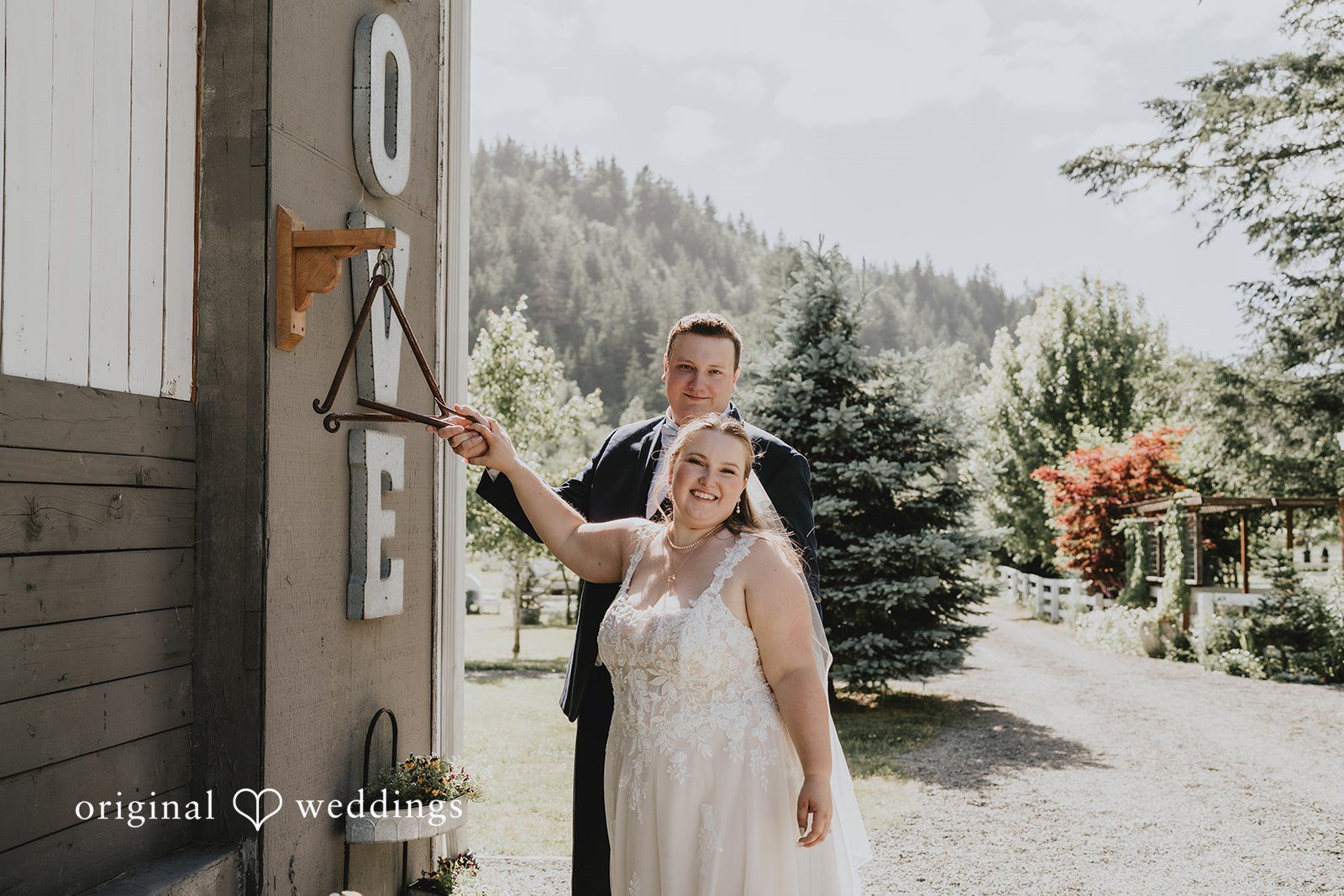 Natalie + DJ Bride and groom posing for wedding photography at Rein Fire Ranch