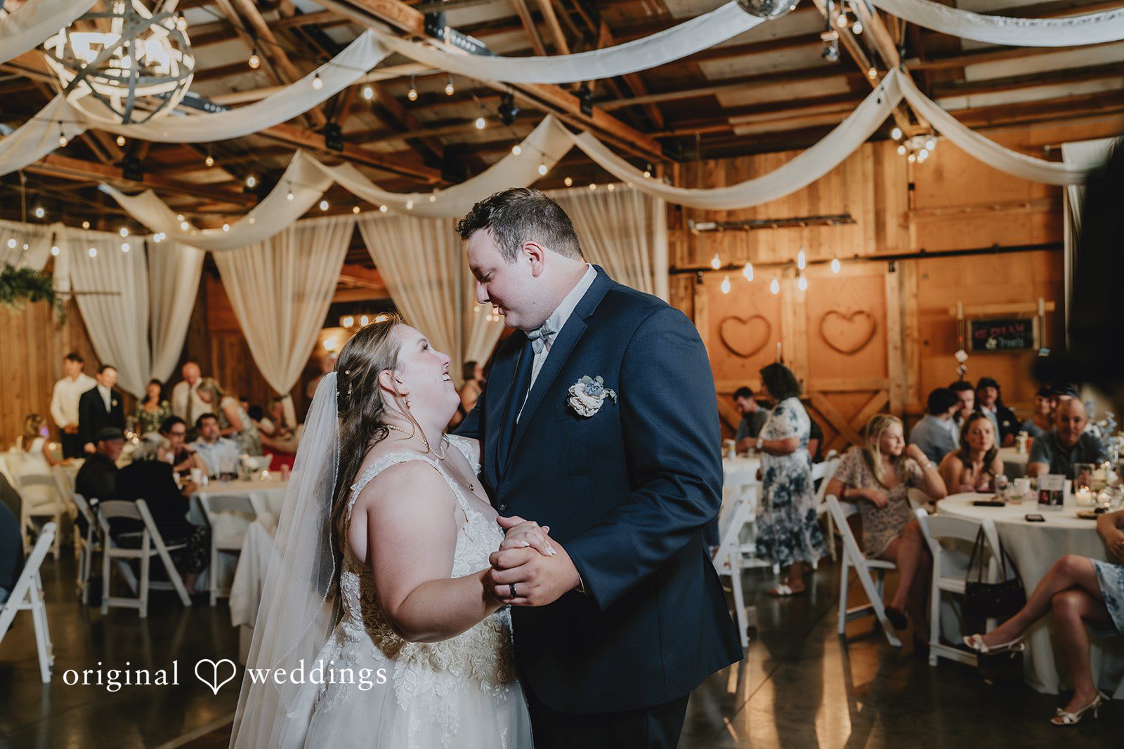 Natalie + DJ Bride and groom sharing a romantic dance at Rein Fire Ranch wedding reception