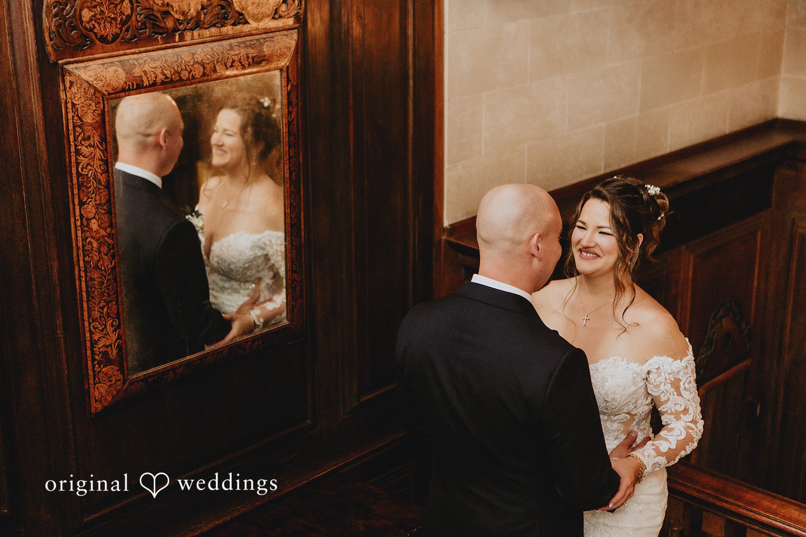 Samantha + Michael Bride and groom looking at one another near a wooden door frame.