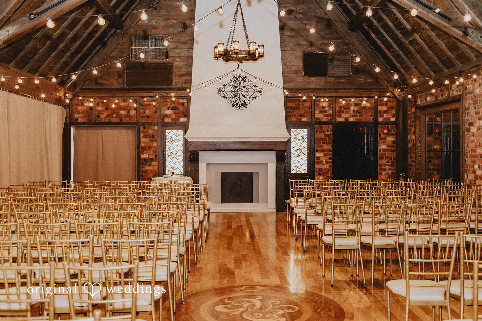 Samantha + Michael Rustic wooden barn ceremony space arranged with rows of chairs.