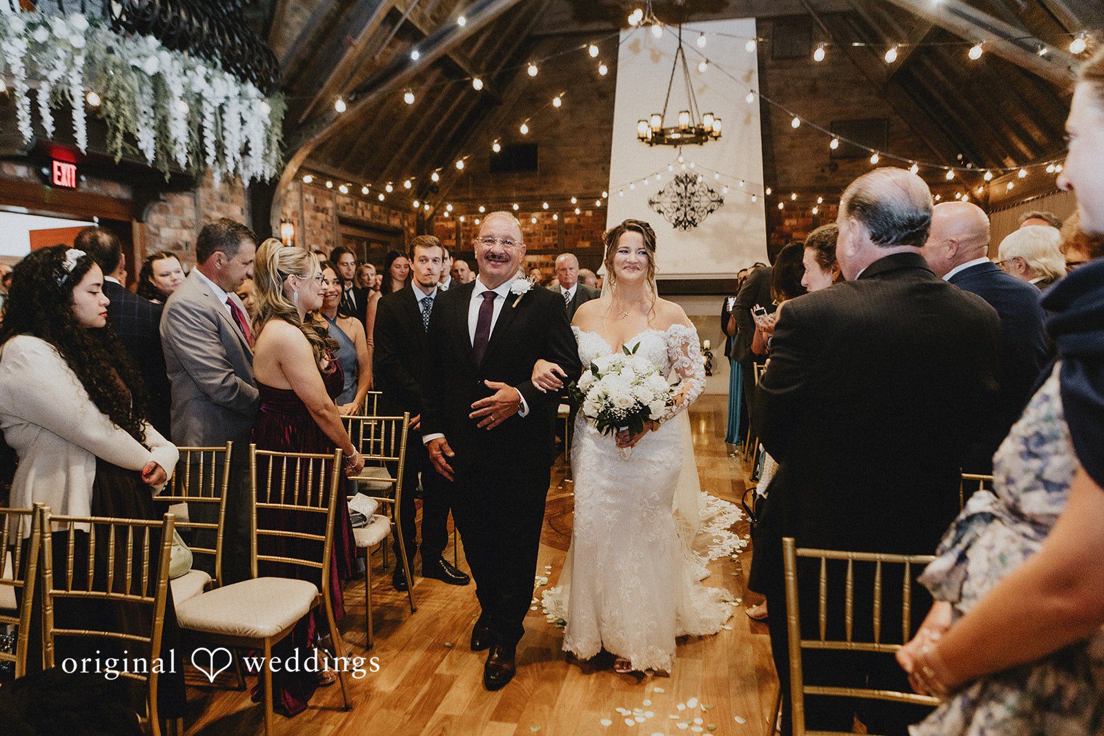 Samantha + Michael Bride walking down the aisle during the wedding ceremony processional.
