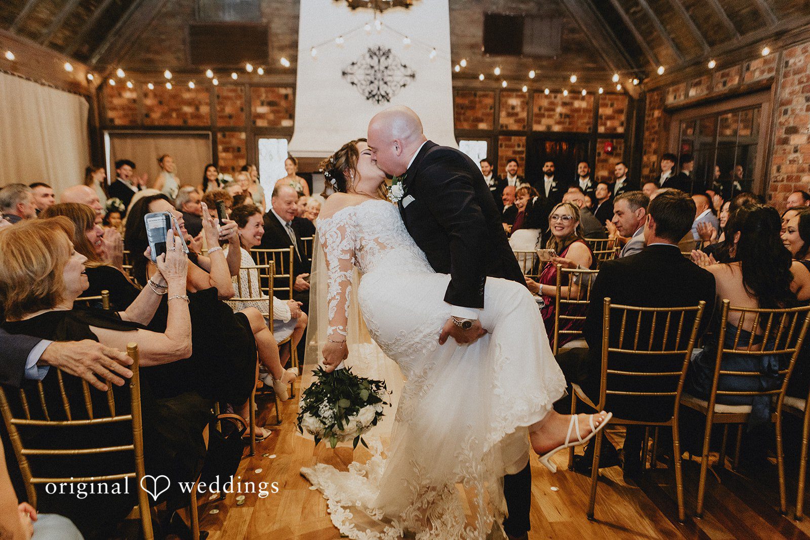 Samantha + Michael Bride and groom kissing after the wedding ceremony.