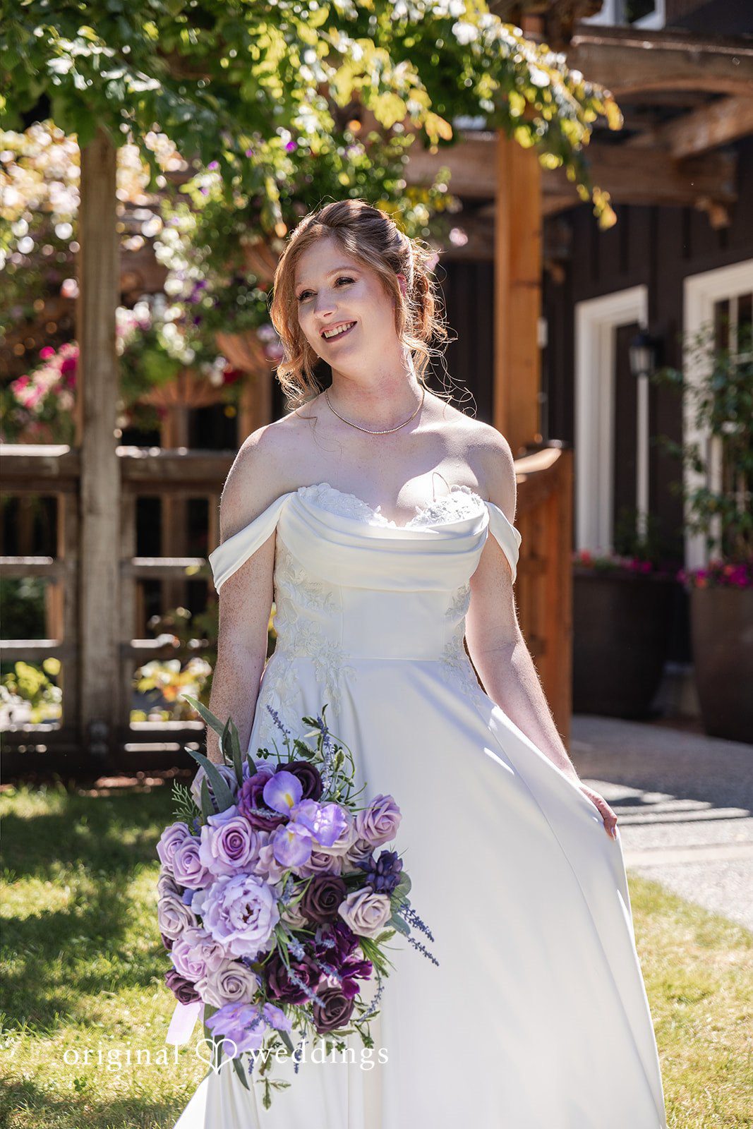 Victoria + Gabriel The bride carrying her huge bouquet