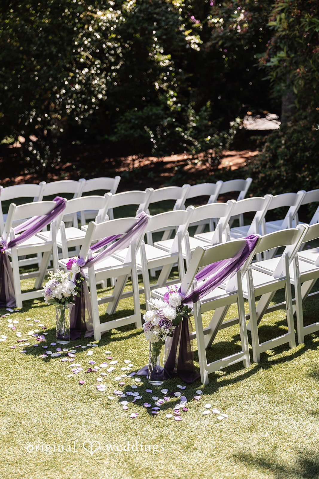 Victoria + Gabriel Beautifully arranged and decorated chairs at the wedding ceremony