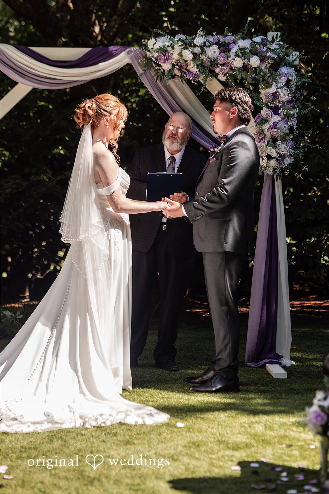 Victoria + Gabriel The bride and groom exchange marital vows
