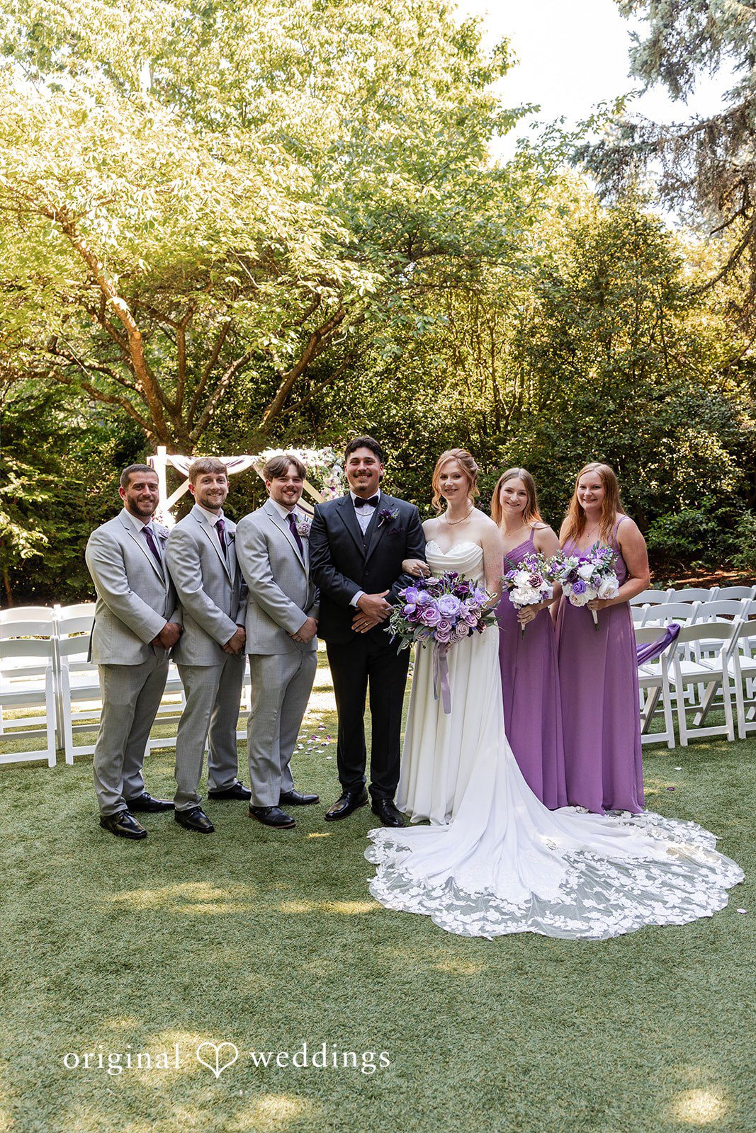 Victoria + Gabriel Our Seattle wedding photographers at Original Weddings captured a stunning portrait of the couple and their bridal party at Robinswood House