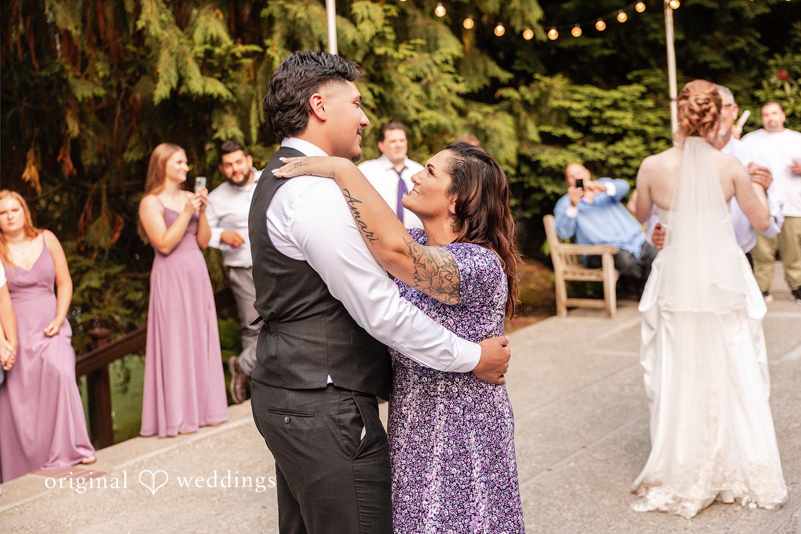 Victoria + Gabriel The groom dances with his mother