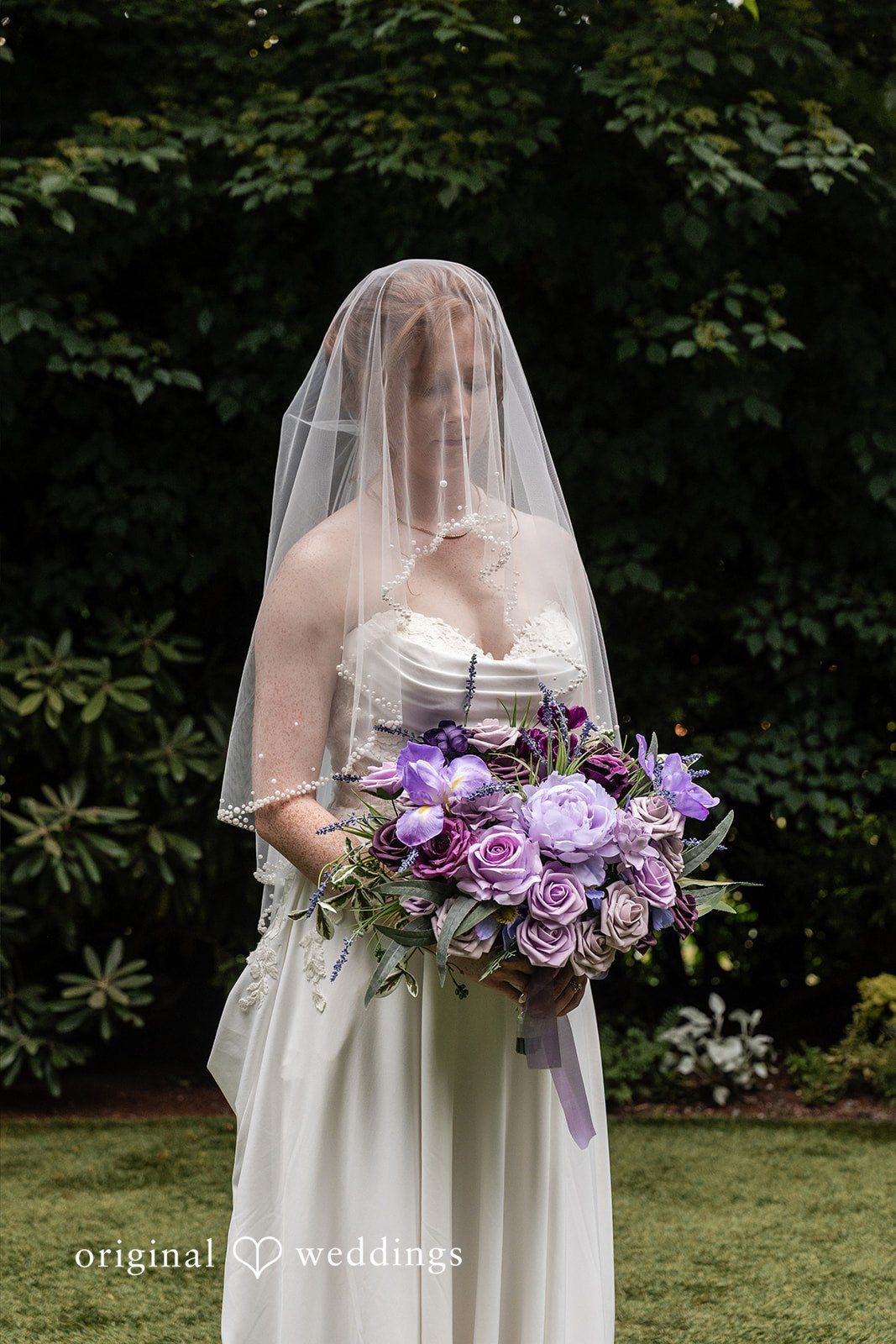 Victoria + Gabriel The bride carrying her huge bouquet