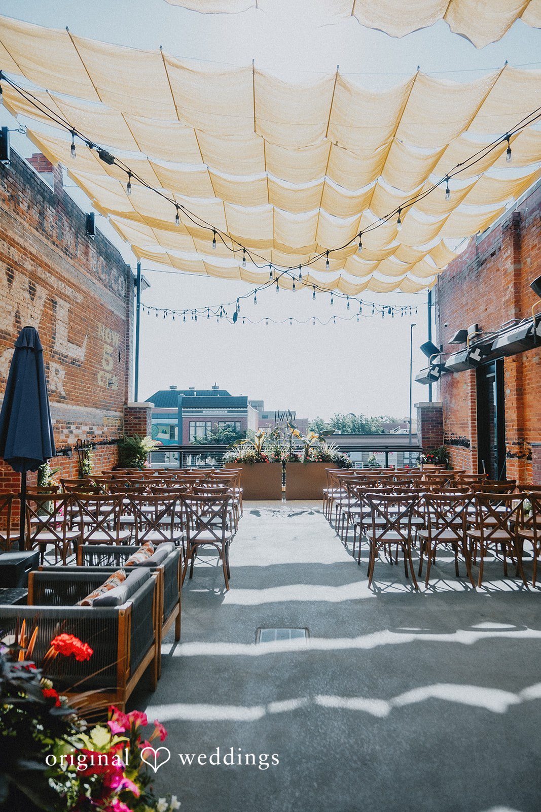 Elizabeth + Willis Empty wedding ceremony setup with rows of chairs facing an altar.