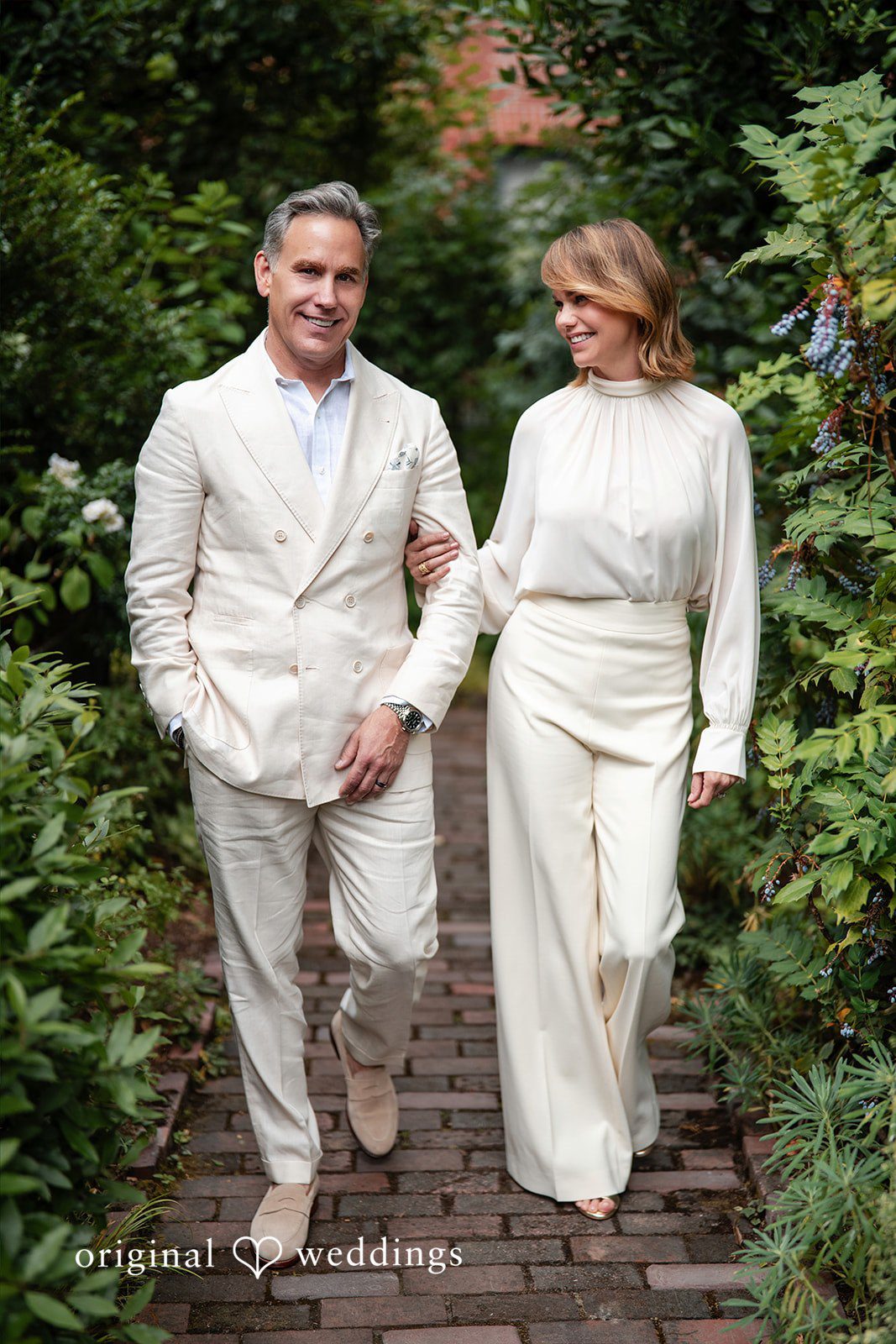 Jennifer + Justin The couple takes a walk through the garden