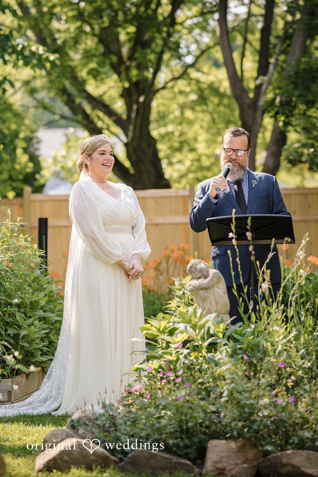 Alice-sun + Michael Bride listening to the priest and looking happily to the groom