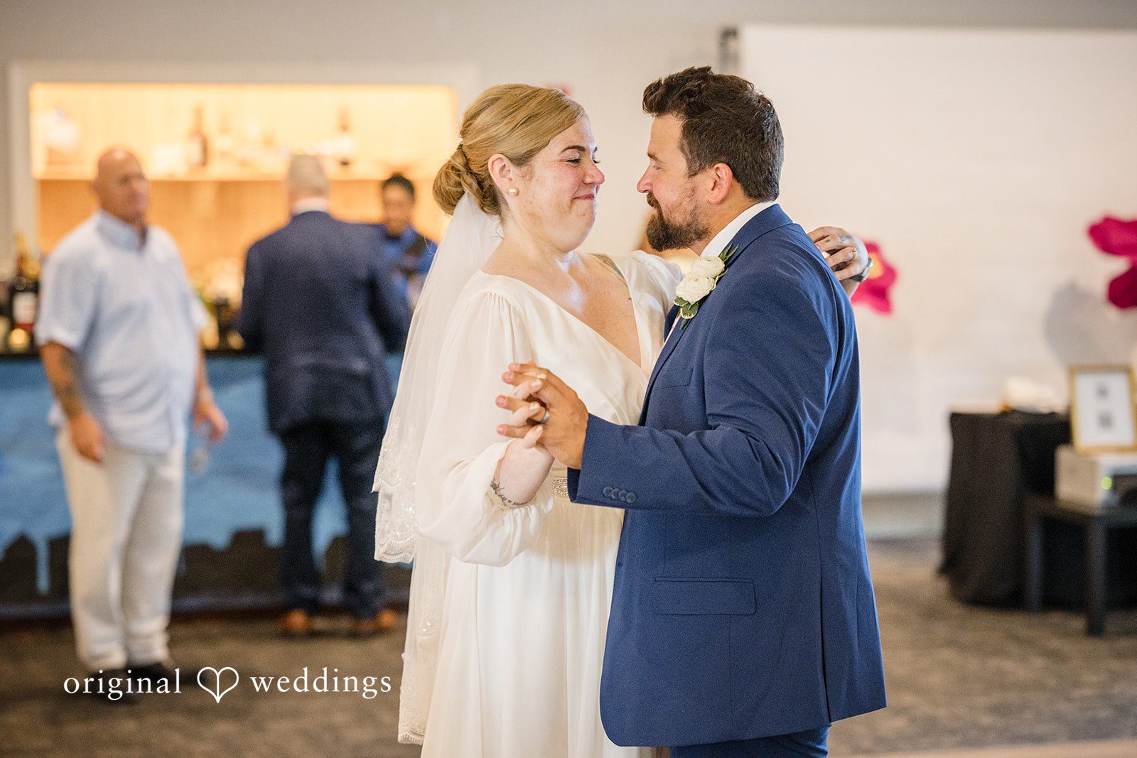 Alice-sun + Michael Bride and groom sharing a romantic dance
