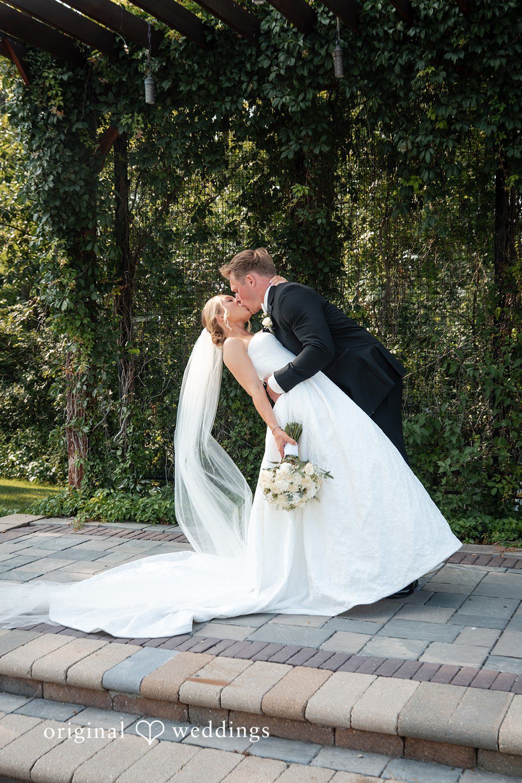 Nikki + Charlie The couple shares a kiss