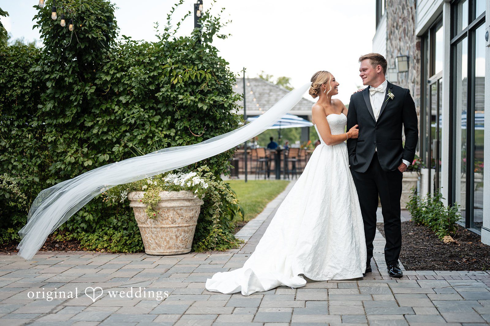 Nikki + Charlie Our Milwaukee wedding photographers captured a beautiful portrait of the couple at the The Lodge Geneva National