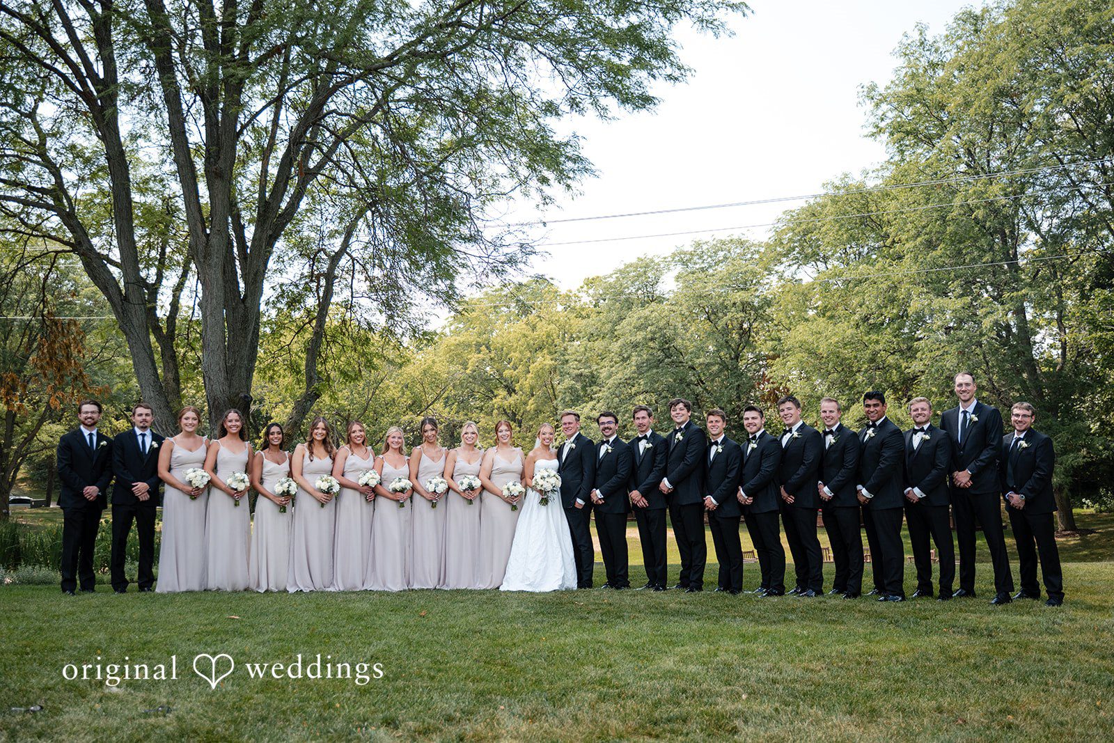 Nikki + Charlie A stunning portrait of the couple and their bridal party