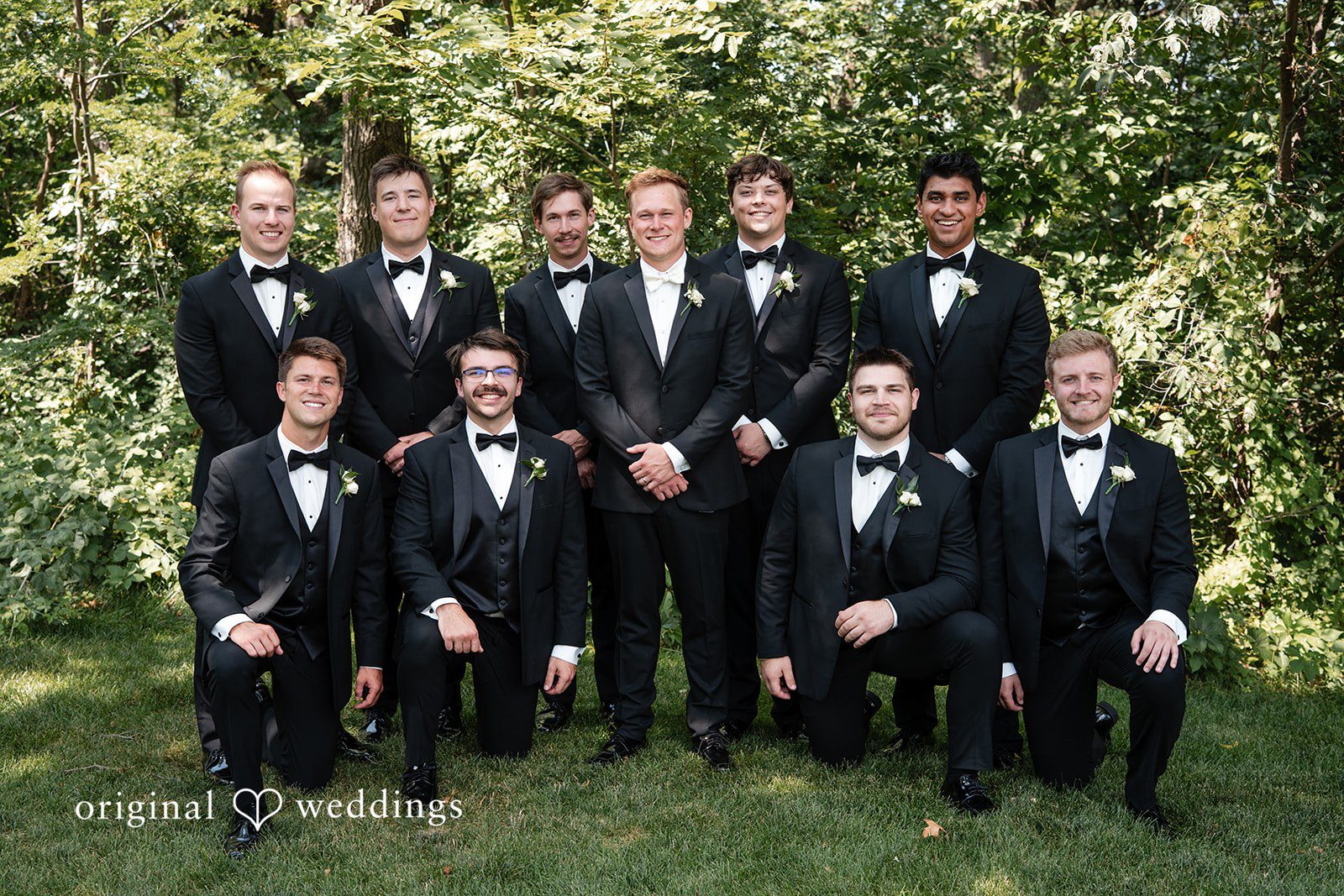 Nikki + Charlie A portrait of the groom and his groomsmen
