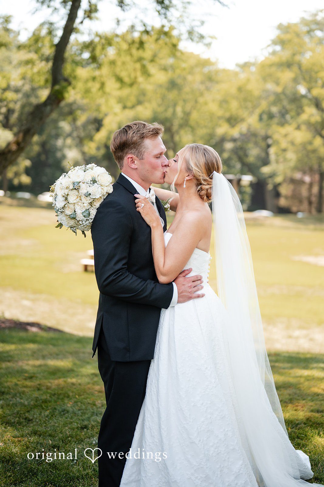 Nikki + Charlie The couple shares a kiss