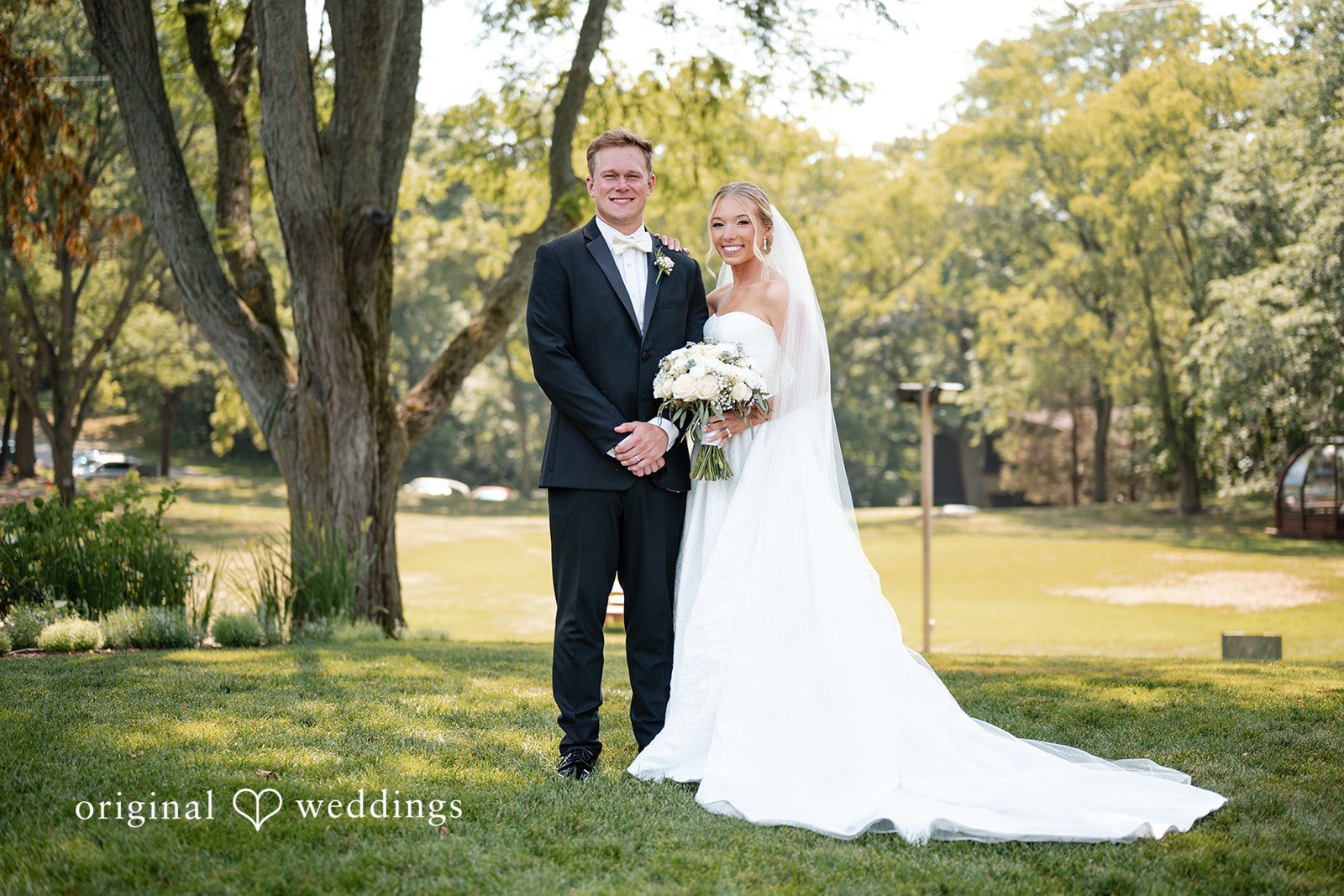 Nikki + Charlie Our Milwaukee wedding photographers captured a stunning portrait of the couple in the outdoors