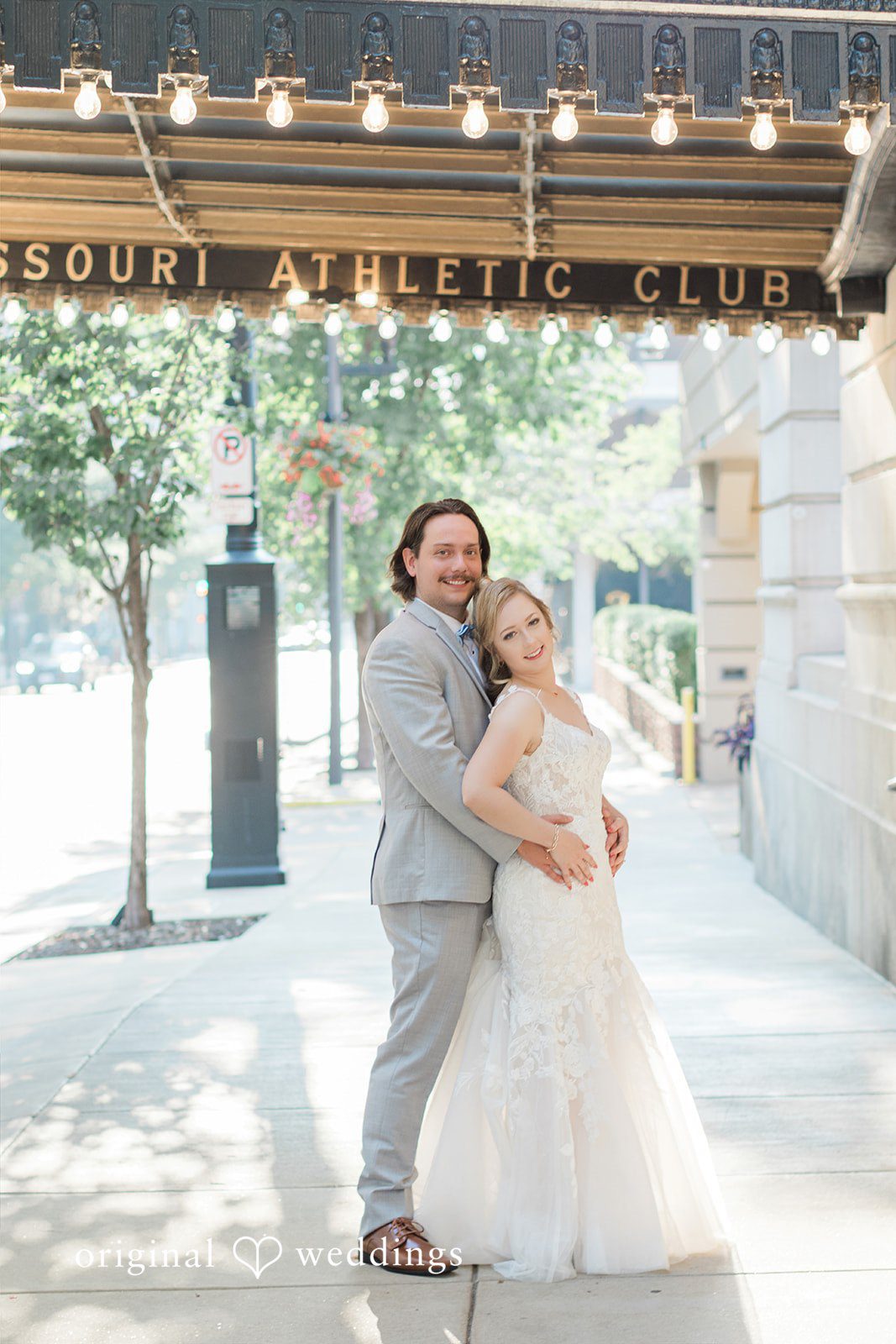 Sara + Michael Stunning Portrait of couple at The Missouri Athletic Club - Downtown by St. Louis Wedding Photographers from Original Weddings.