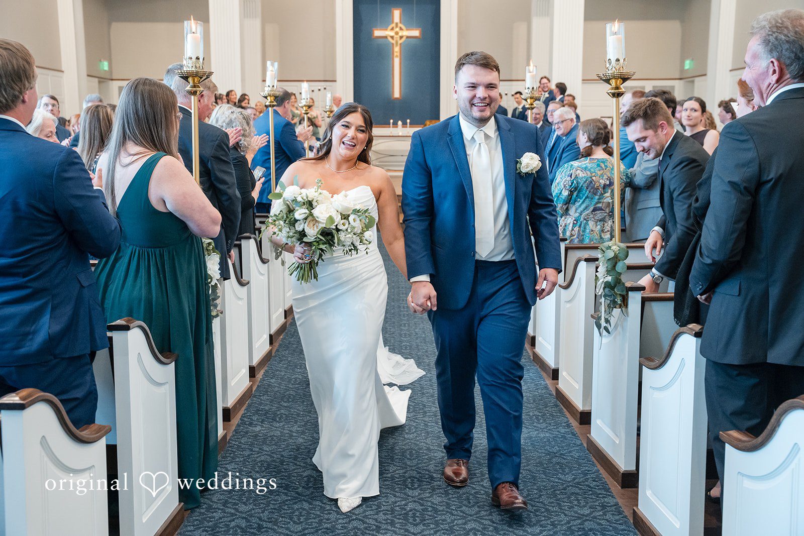 Chelsea + Matthew Couple walking outside after ceremony at The Rivulet