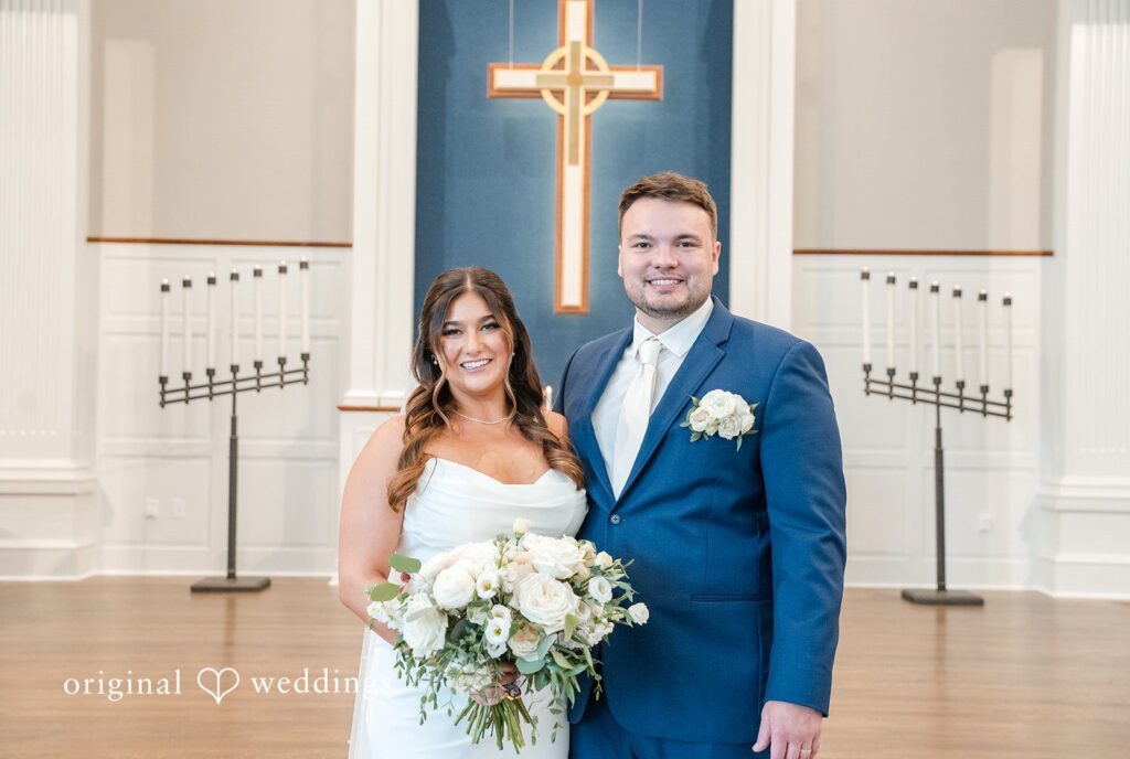Chelsea + Matthew Milwaukee Wedding Photographers capturing couple posing together facing forward at The Rivulet by Original Weddings