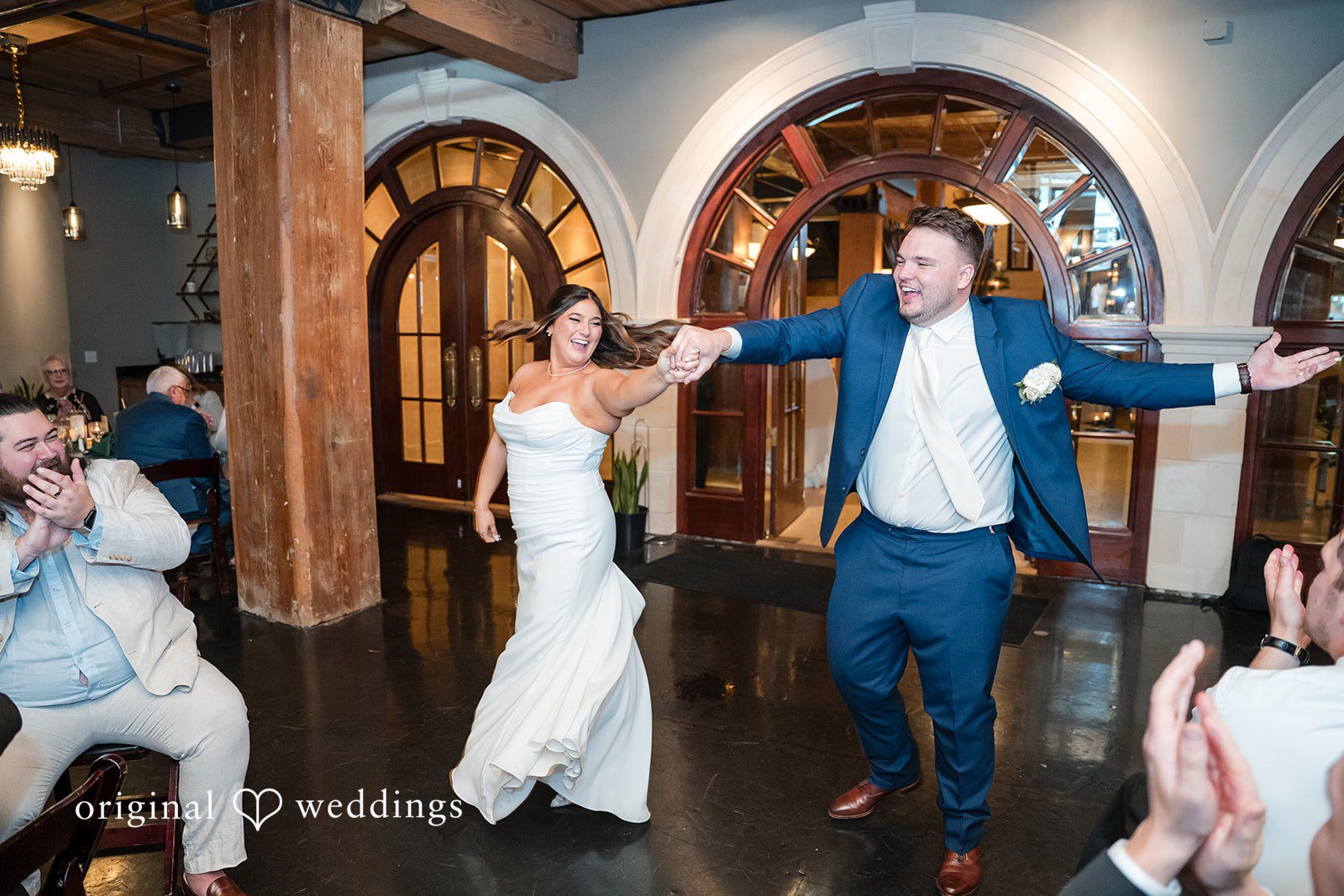Chelsea + Matthew Couple enjoying their special entrance at The Rivulet