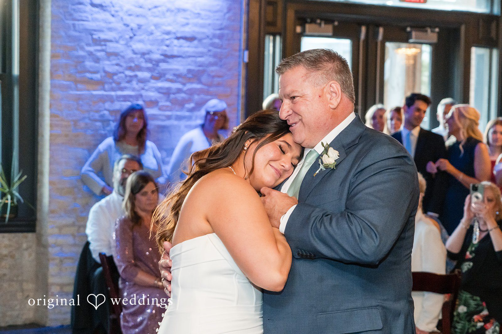 Chelsea + Matthew Fun wedding dance moment with someone while hugging at The Rivulet