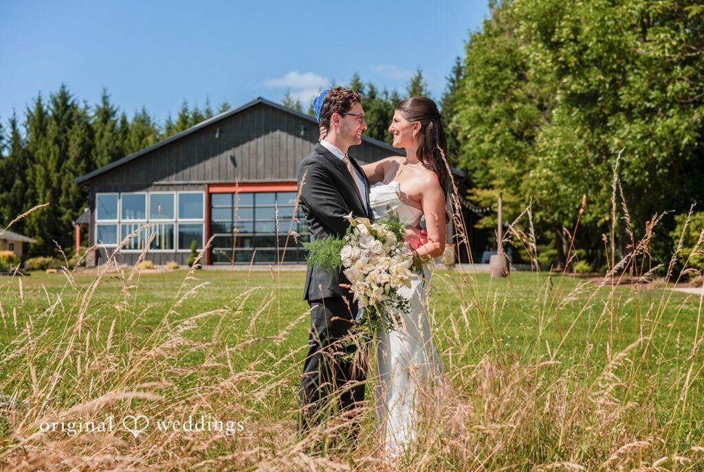 Zechariah + Tova Stunning Portrait of Couple at The Water Oasis by Portland Wedding Photographers from Original Weddings.