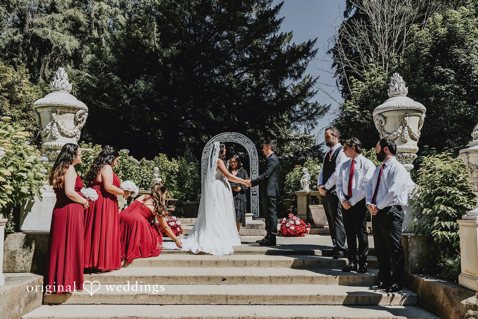Sharmaine + Ronald A wedding ceremony taking place a large stone building.