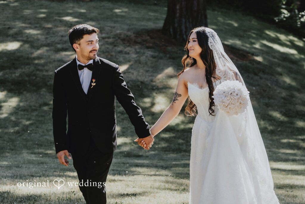 Sharmaine + Ronald Stunning Portrait of Couple at Thornewood Castle by Seattle wedding photographers from Original Weddings.