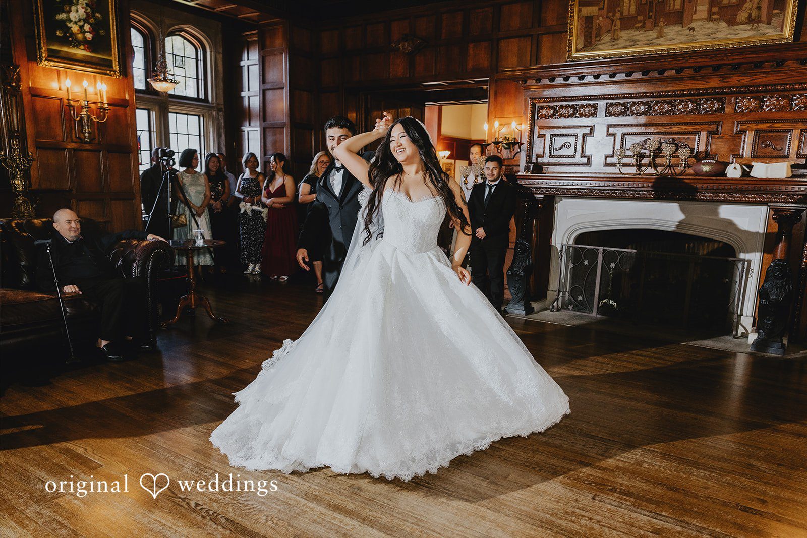 Sharmaine + Ronald A bride spinning on the dance floor in her white wedding gown.