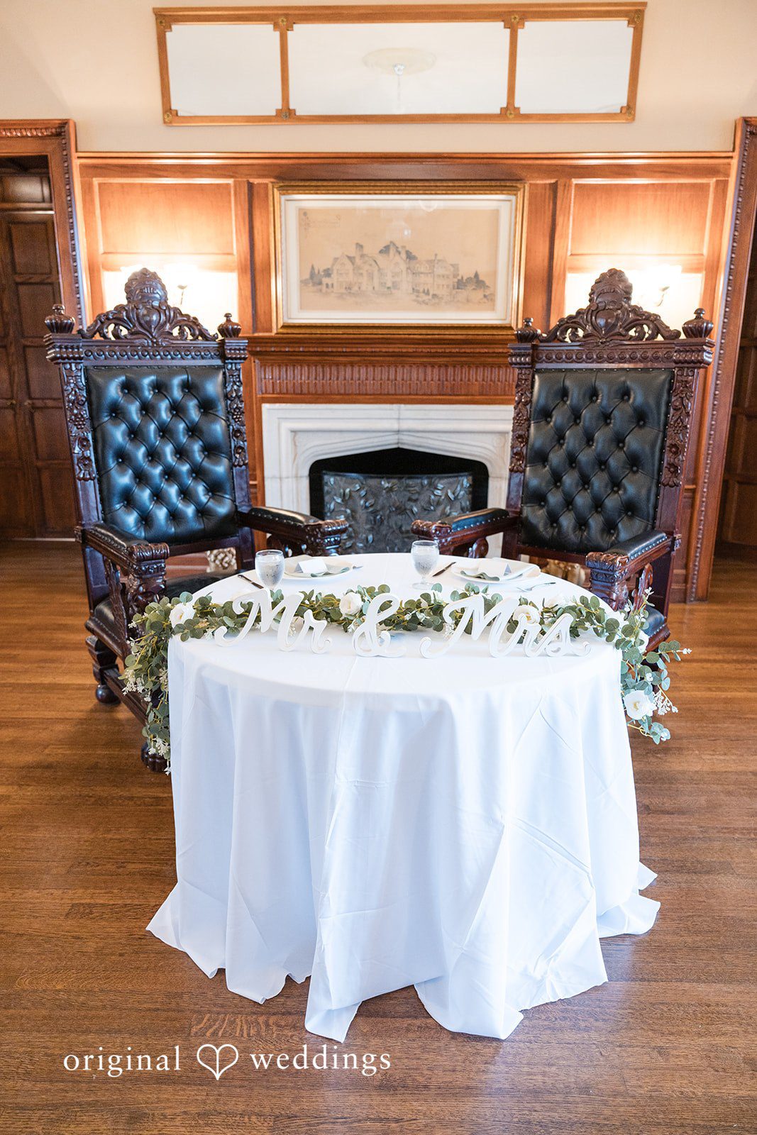 Kaelyn + Isaac Couple's chairs and table arrangement