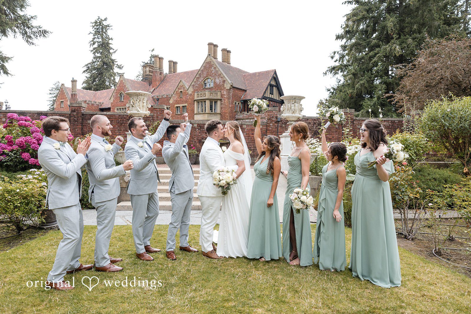 Kaelyn + Isaac Our Seattle wedding photographers captured a romantic portrait of the couple at the Thornewood Castle with cheers from their guests