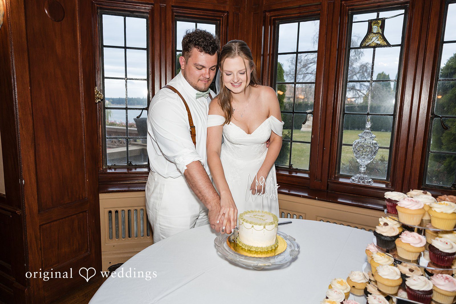 Kaelyn + Isaac The couple cuts their wedding cake