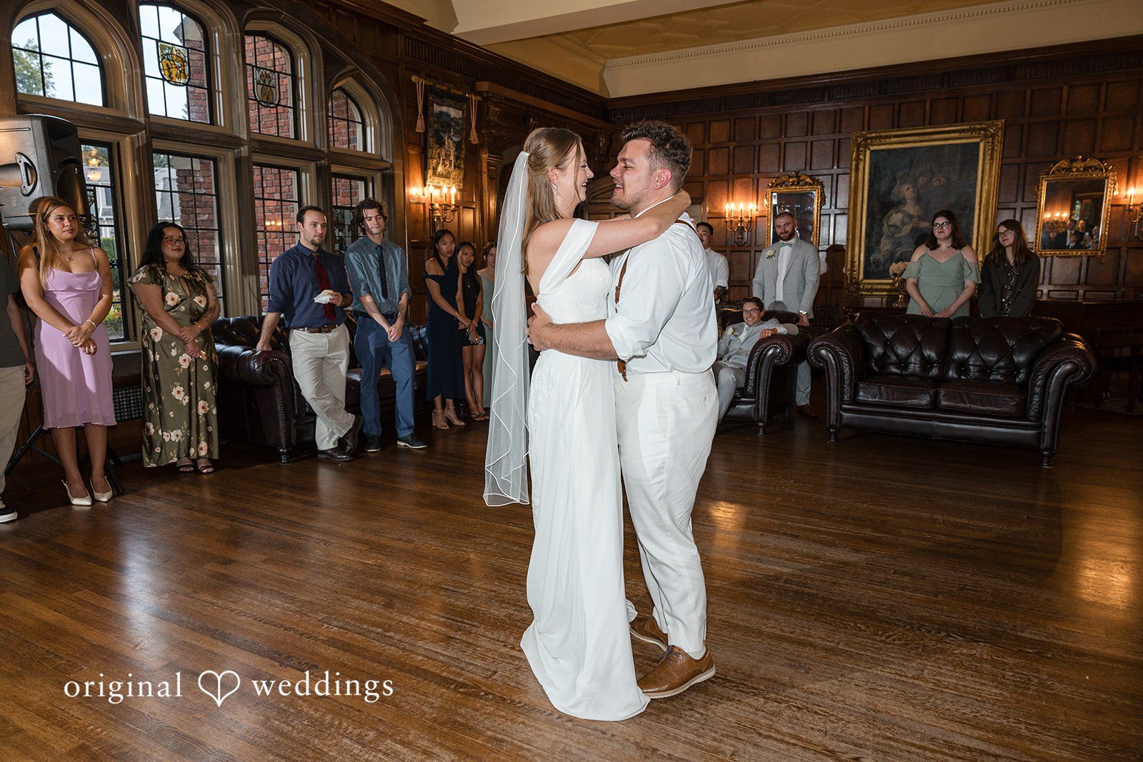 Kaelyn + Isaac The couple dances in the hall