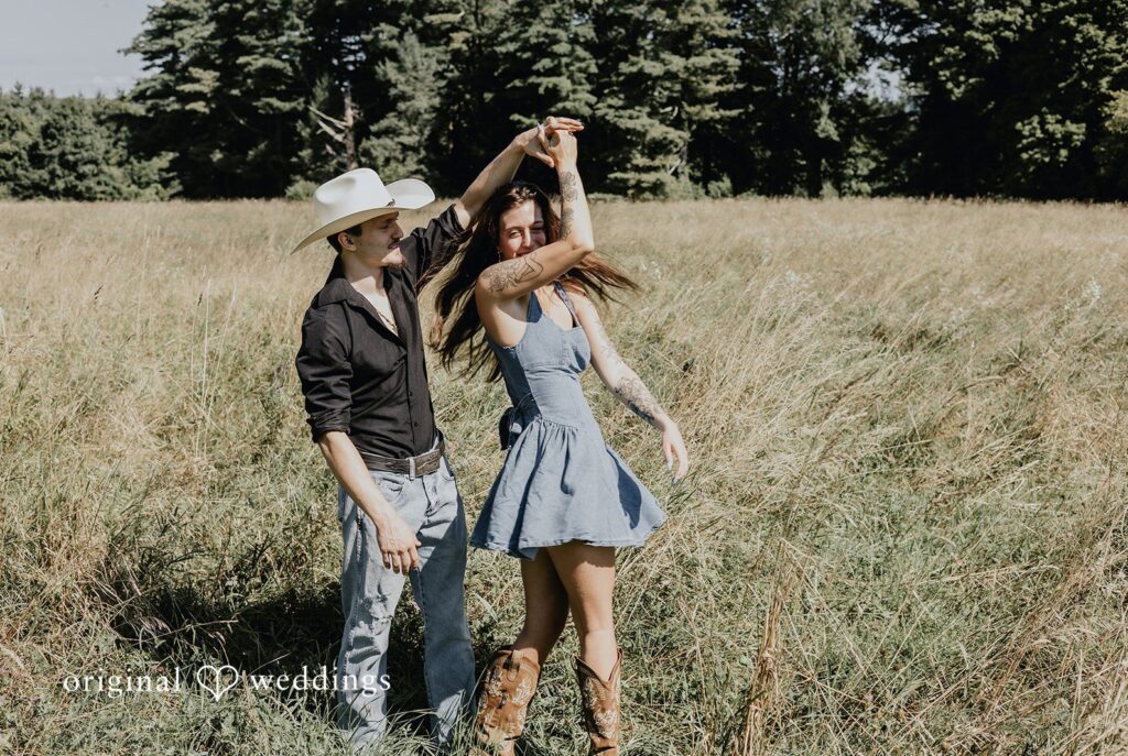 Meghan + Kal Engagement photography services by Original Weddings capturing close-up of couple with bride smiling at Topsmead Forest.