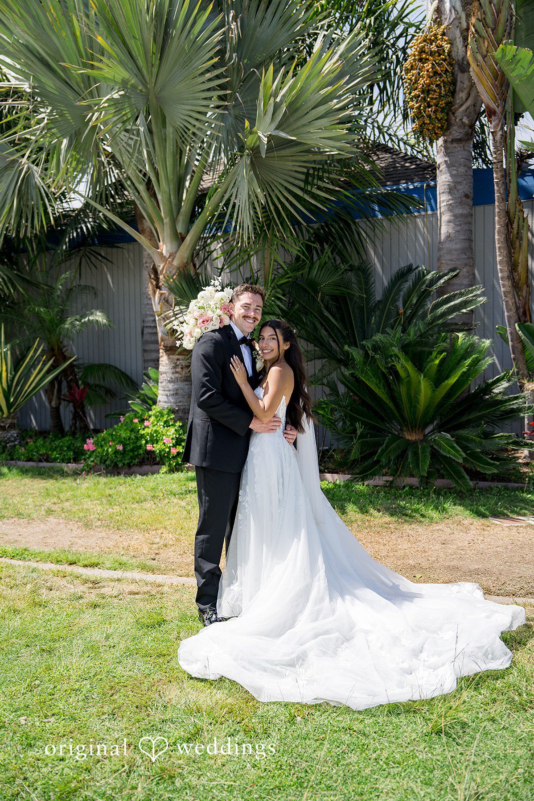 Kalina + Malakai Stunning Portrait of Couple at Tower Beach Club by San Diego Wedding Photographers from Original Weddings.