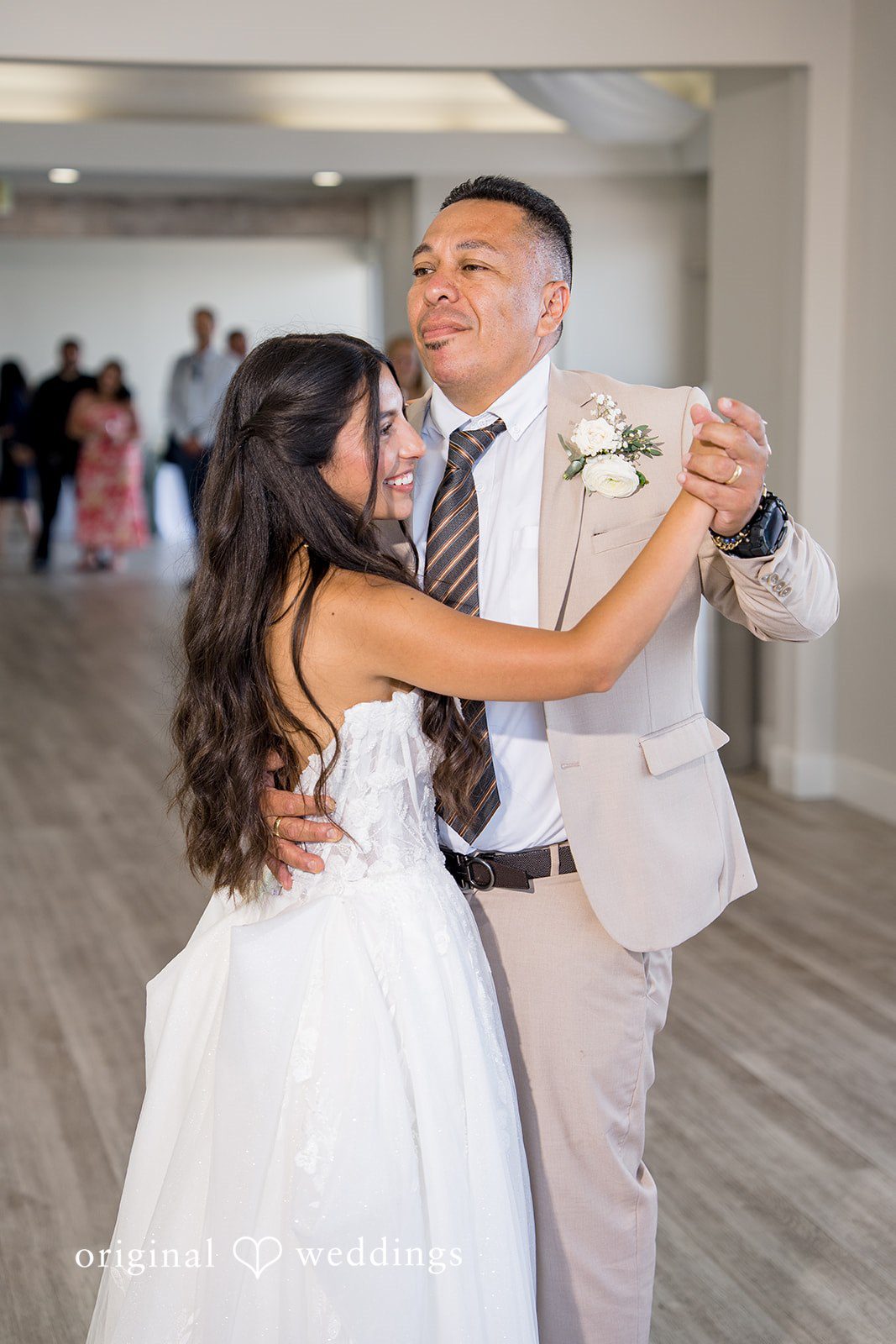 Kalina + Malakai Bride and man dancing together at the reception.