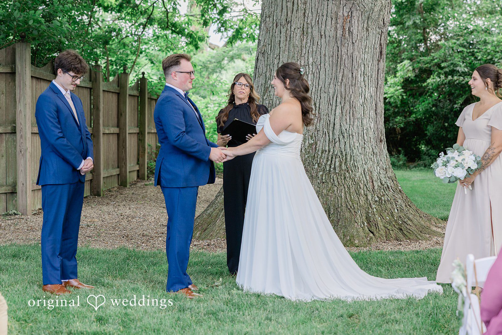 Emily + Joshua Couple looking at each other with smiles at Whitehall Columbia captured by Cleveland Wedding Photographers from Original Weddings.